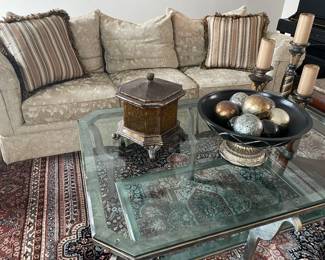 3-cushion sofa with down back pillows, burnished champagne metal and glass coffee table