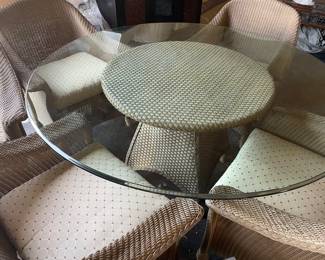 Round patio table with 6 chairs with seat cushions.  Patio  table has a glass top 48" round  4 -chairs are comfortable for eating and then 2 extra for cocktails :)