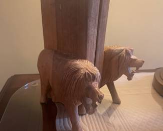 Wood carved lion bookends 