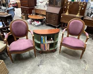 Two small chairs with vintage small table and books