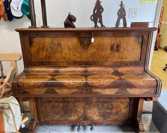 Upright burl wood piano