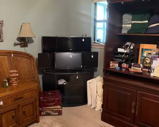 TV, monitors, decor boxes and vintage TV stand with glass front