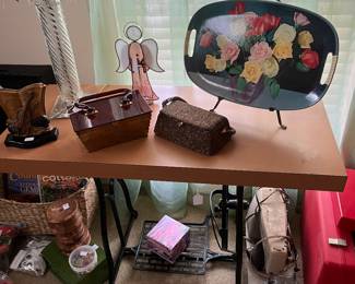Vintage purses and sewing machine table decor