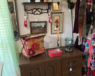Sewing cabinet with a Bernina sewing machine inside and all the sewing items with it. 
