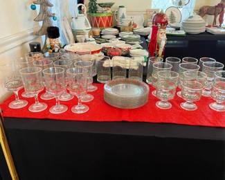 Arby’s Christmas glasses with gold rims and holly. 