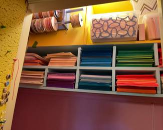 Thousands of items for scrapbooking - construction paper, stamps, quilting, miniature stickers, fabric, and more.