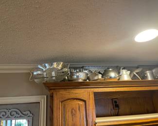 Hammered aluminum pieces.