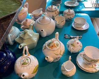 Pretty English teapots and matching cups.