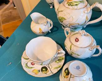 Winrose Collection of teapots, teacups, saucers, creamer, sugar.