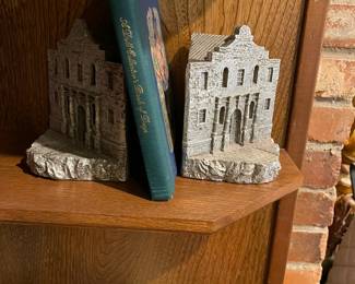 Matching silver (colored) metal bookends.
