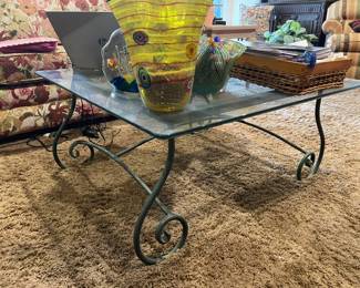 Wrought iron and glass coffee table