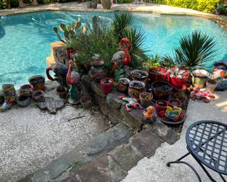 Talavera pottery and a large assortment of pots for plants. 