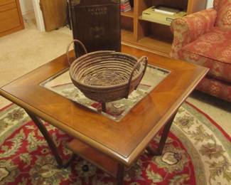 A great end table with a beveled glass insert and metal legs (a coffee table and accent table available)