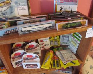 Vintage collector trains and accessories are still in the boxes.