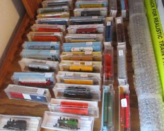 Vintage collector trains and accessories are still in the boxes.