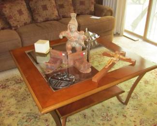 A great coffee table with a beveled glass insert and metal legs (an accent table and end table available)