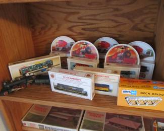 Vintage collector trains and accessories are still in the boxes.