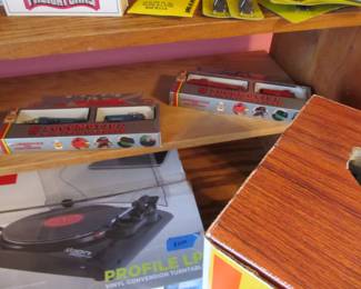 Vintage collector trains and accessories are still in the boxes.