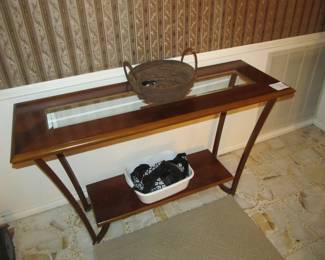 A great accent table with a beveled glass insert and metal legs (a coffee table and end table available)