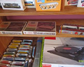 Vintage collector trains and accessories are still in the boxes.