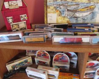 Vintage collector trains and accessories are still in the boxes.