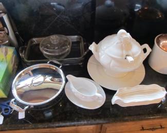 An ALL-CLAD cooking pot, very nice! brand new! Also, a lovely soup tureen or a very large gravy boat, because we all love gravy. hehe!