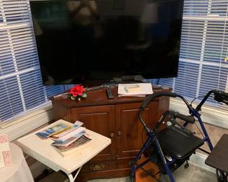 TV, rolling walker, computer tray
