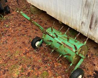 Lawn aerator attachment