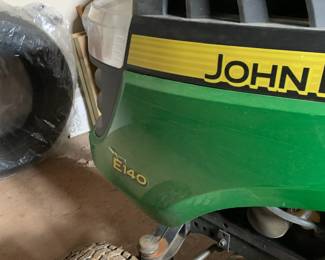 John Deere E140 - 48” deck