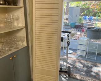 Louvred four panel screen