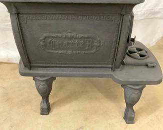 SIDE VIEW CAST FOOTED STOVE