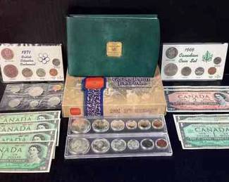 SHBR708 Canadian Minted Money A collection of various Royal Canadian bills and coinage. Includes a Royal Canadian 2002 minted Golden Jubilee Jubilé D'or proof set
