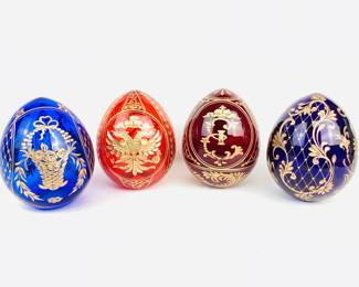 SBHR908 St Petersburg Russian Faberge Crystal Eggs 4 crystal glass eggs in cobalt, blue, red, & burgundy with gold gilt decoration. &nbsp;Russia, St Petersburg, handi-work label on bottoms.
