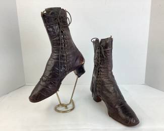 BIHY110 1860 Girls Lace Up Leather Boots Pair of lovely, brown, kid leather, young girls, straight boots. &nbsp;Made of very soft leather, they have a scallop edge with white decorative stitching. C. 1850-1860.
