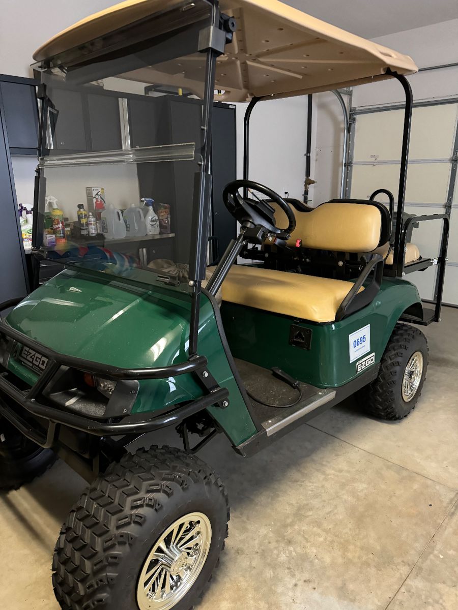 2015 E-Z GO  TXT ELECTRIC GOLF CART
( We will be taking bids on the golf cart. Please call 404-285-2140 to place a bid. Thank you!)
