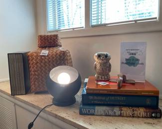 MCM Eyeball Style Light, Lidded Woven Basket, MCM Owl Statue, "World Architecture" Chartwell Books, "The Buildings of Detroit: A History" by Ferry, " Frank Lloyd Wright" Bramhall House