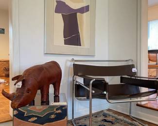 Designer cube by Belaire designs, Original brown leather wassily chair by marcel breuer, Abercrombie Omersa Rhino