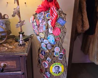 Wire frame mannequin with vintage buttons