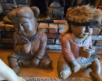 Habd carved heavy wood statues 