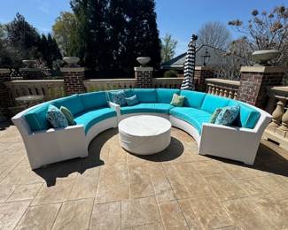 New Frontgate white wicker sectional with matching frontgate coffee table, mold & fade resistant Sunbrella, cushions and pillows.  Being sold 1/2 of retail.  