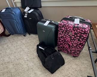 Assorted luggage all in good shape for low prices
