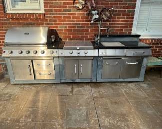Members mark outdoor grill.  Grill works ok, middle burner section not working, right side faucet needs replacing.  Black granite coutertop.  Priced as-is at $200 for all three.  Under cabinet frig was working a few years ago, but not tested lately.