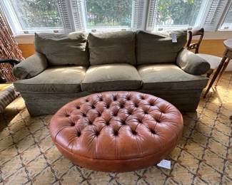 Great green sofa and brown leather tufted ottoman.  Sofa is made in Hickory NC with 8 way hand tied springs and very comfortable.  sofa is 85L x 36W