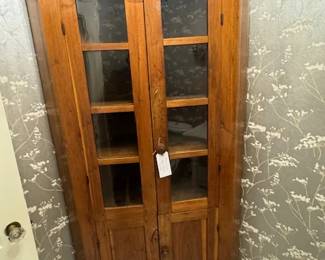 Early American, hand made,  late 1800's corner hutch with antique glass in tact.
