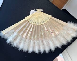 ivory fan with feathers