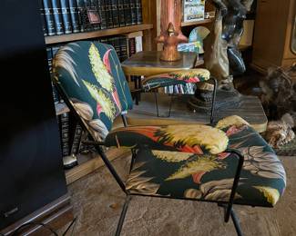 wrought iron armchair with floral cushion