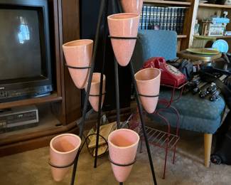 wrought iron bullet planter stand