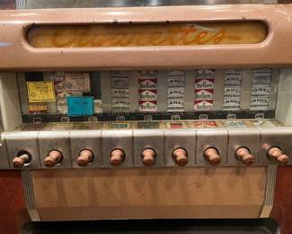 vintage cigarette machine, lights and works!