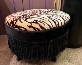 fringed zebra striped ottoman. 