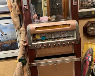 vintage cigarette machine; lights and works!